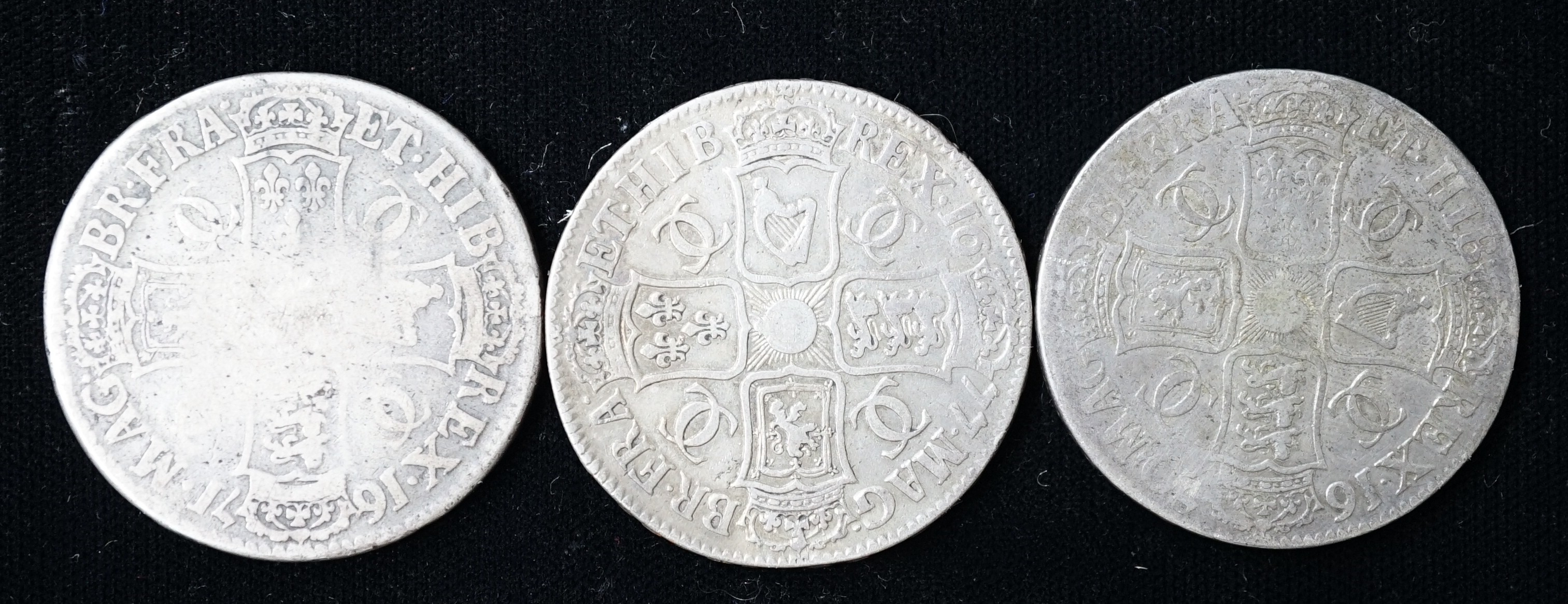 Three Charles II silver crowns, 1670, about Fine, 1677, near Fine, and 1671, VG